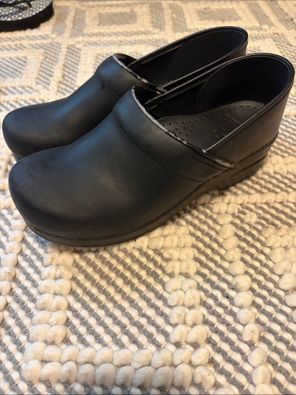 Dansko Black Leather Slip-On Clogs